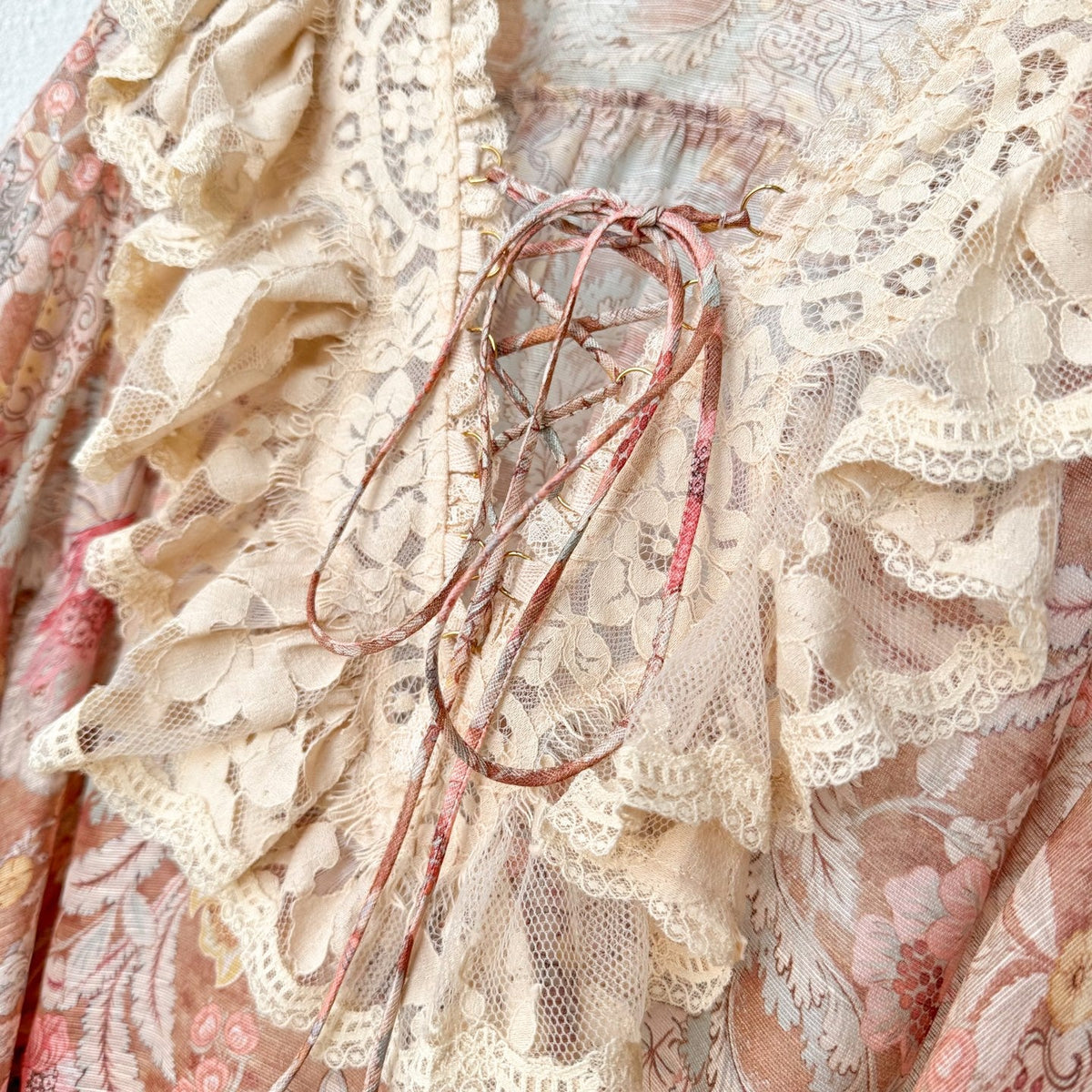 The Rebellion Lace-Up Mini Dress in Tan Floral