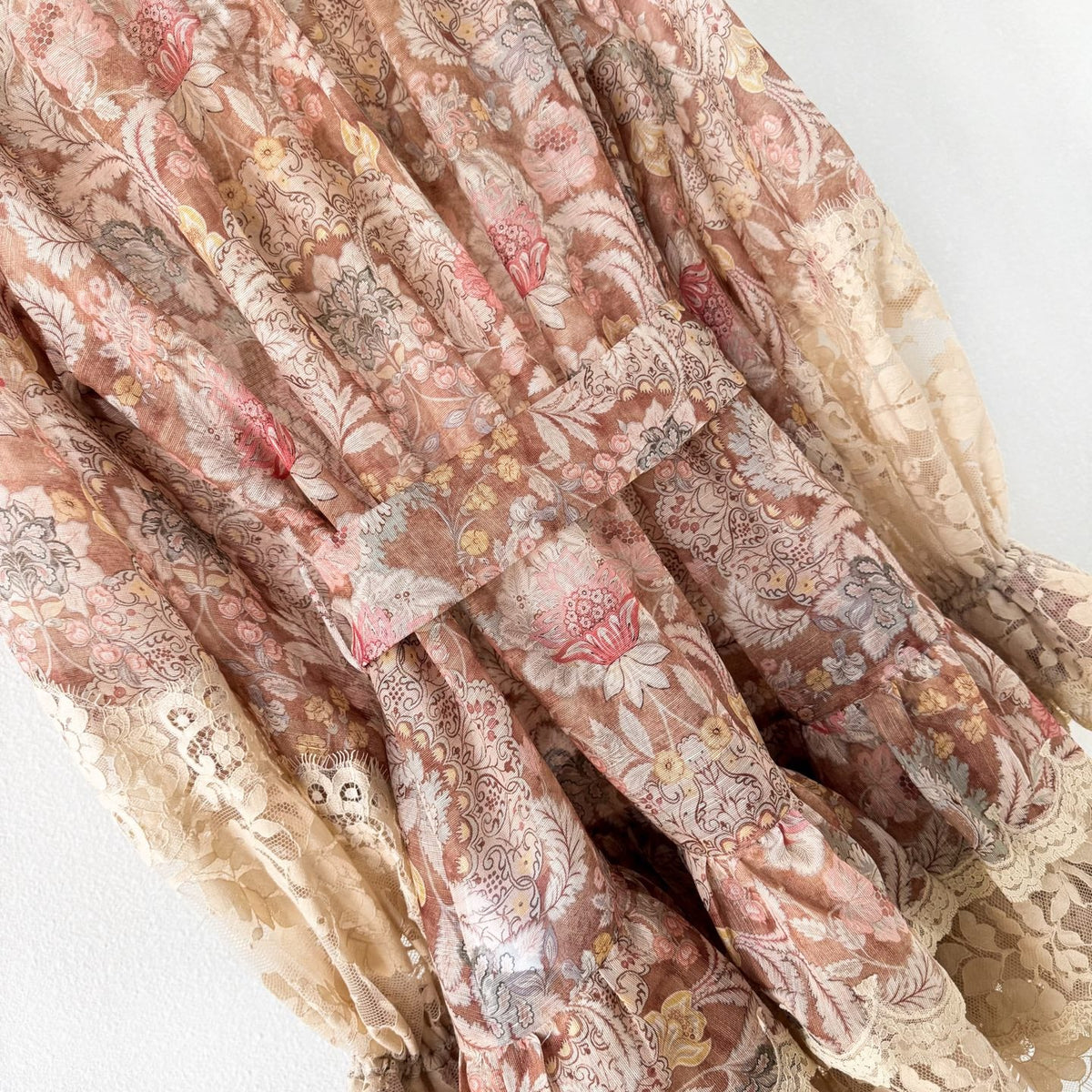 The Rebellion Lace-Up Mini Dress in Tan Floral