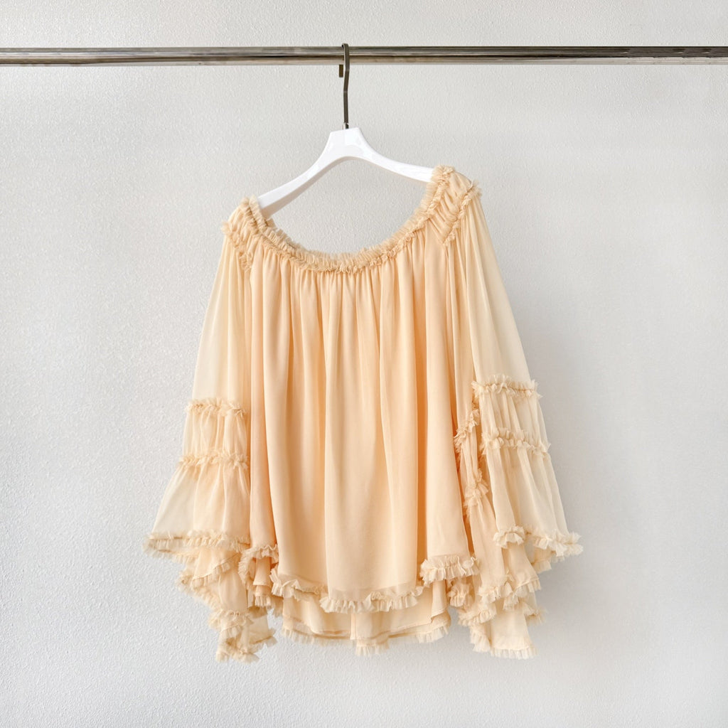 The Rebellion Fray Flutter Blouse in CreamThe Rebellion Fray Flutter Blouse in Cream