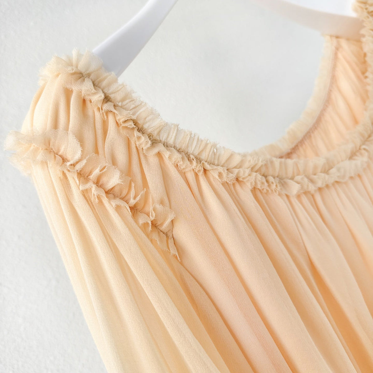 The Rebellion Fray Flutter Blouse in CreamThe Rebellion Fray Flutter Blouse in Cream