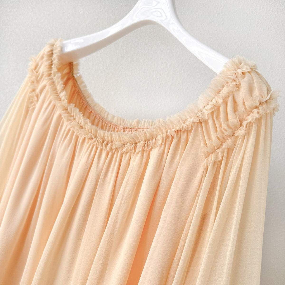 The Rebellion Fray Flutter Blouse in CreamThe Rebellion Fray Flutter Blouse in Cream