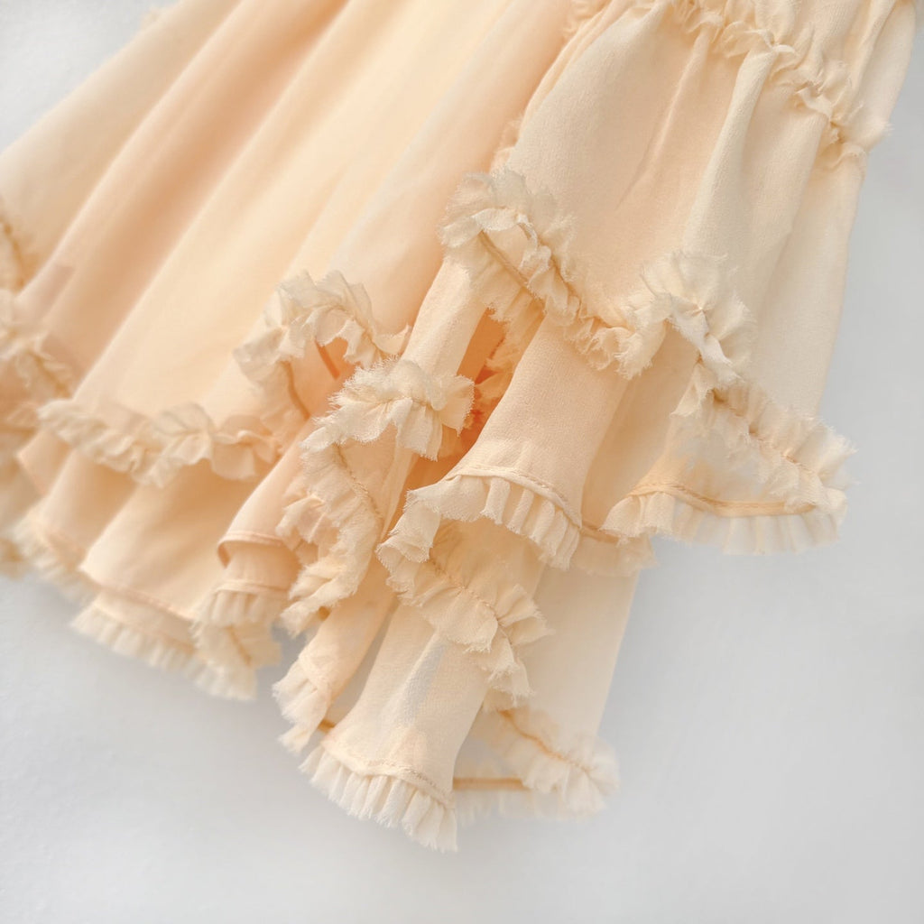 The Rebellion Fray Flutter Blouse in CreamThe Rebellion Fray Flutter Blouse in Cream