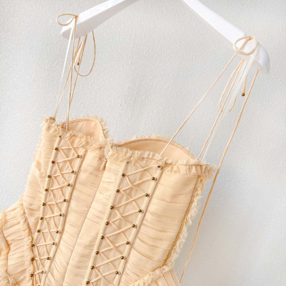 The Rebellion Frayed Corset in Cream